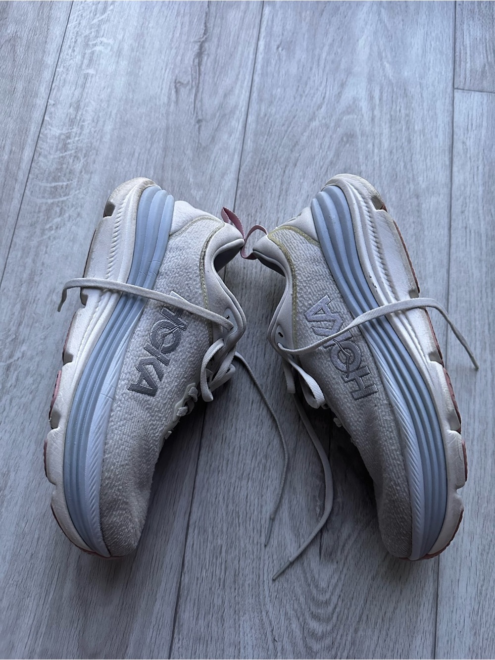Hoka Womams White and Light Gray Running Sneakers with Pink Heel Tabs